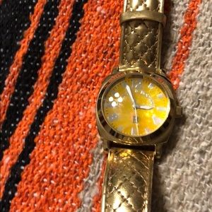 Dooney & Bourke gold tone watch